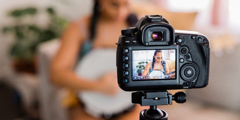 A lady filming for YouTube