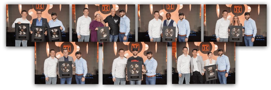 Winners with plaques